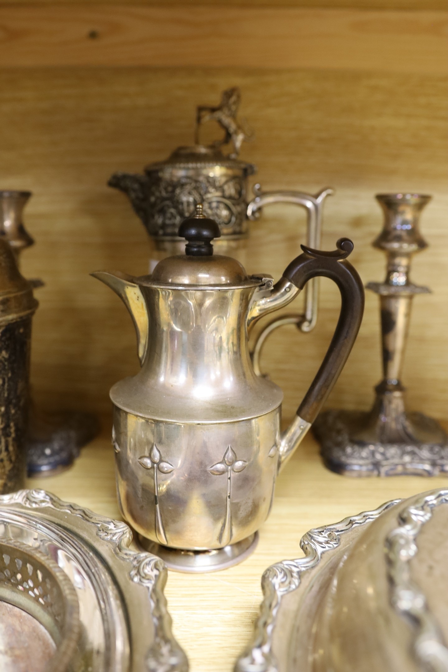 A group of mixed plated wares including tureen, cocktail shaker, claret jug, candlesticks etc.